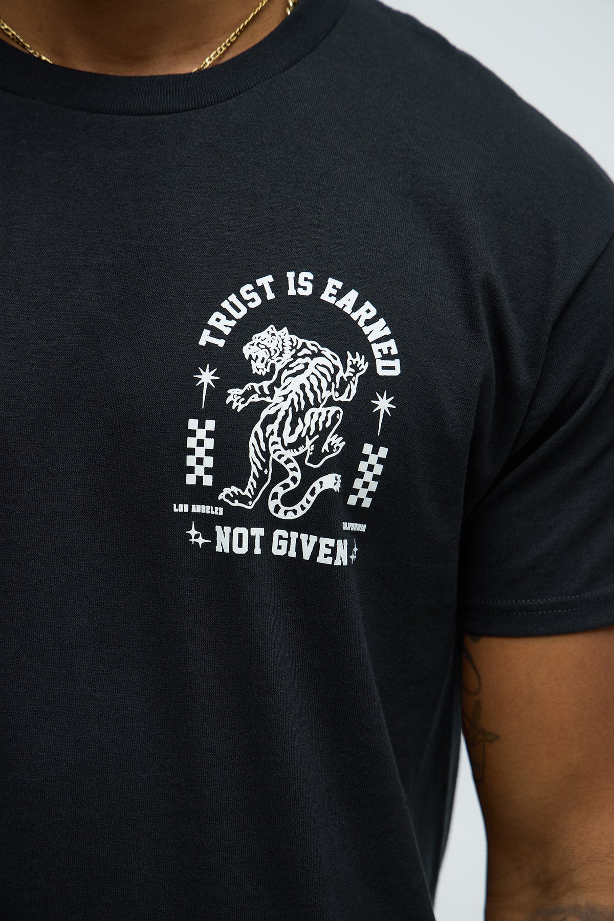 Trust is Earned Tee- Black